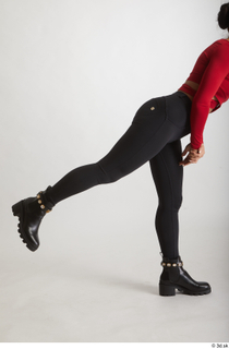  Zuzu Sweet  1 black boots black trousers casual dressed flexing leg side view 0016.jpg
